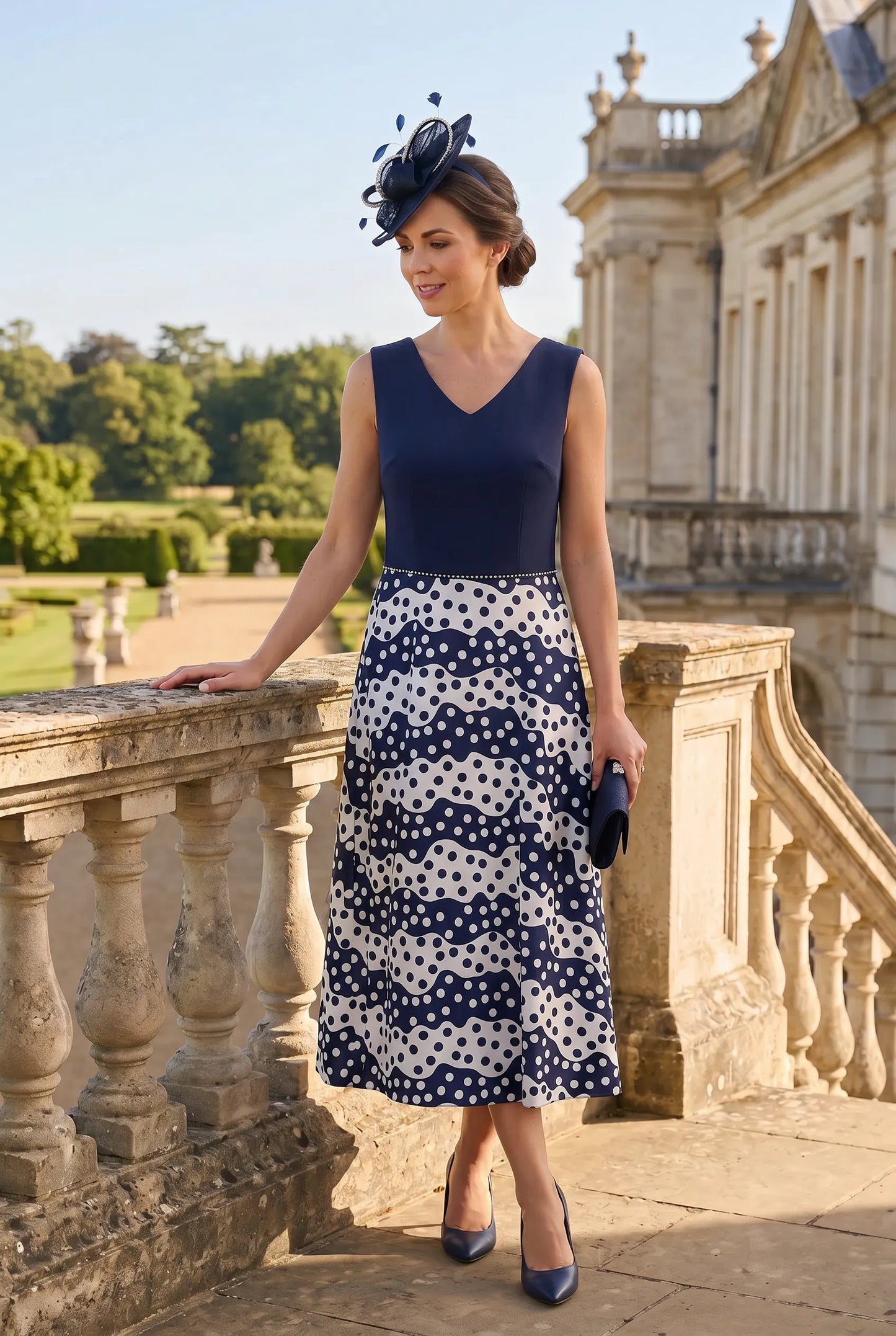 front view of Lizabella 7202 navy Mother of the Bride dress showing the flattering A-line silhouette