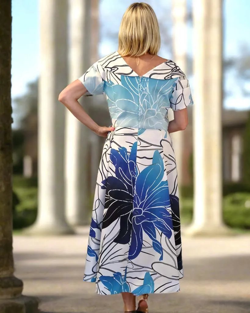 This fit and flare dress features a stunning and lively floral design, complete with a Bardot neckline, short sleeves, and convenient side slip pockets. Made of 100% polyester fabric.