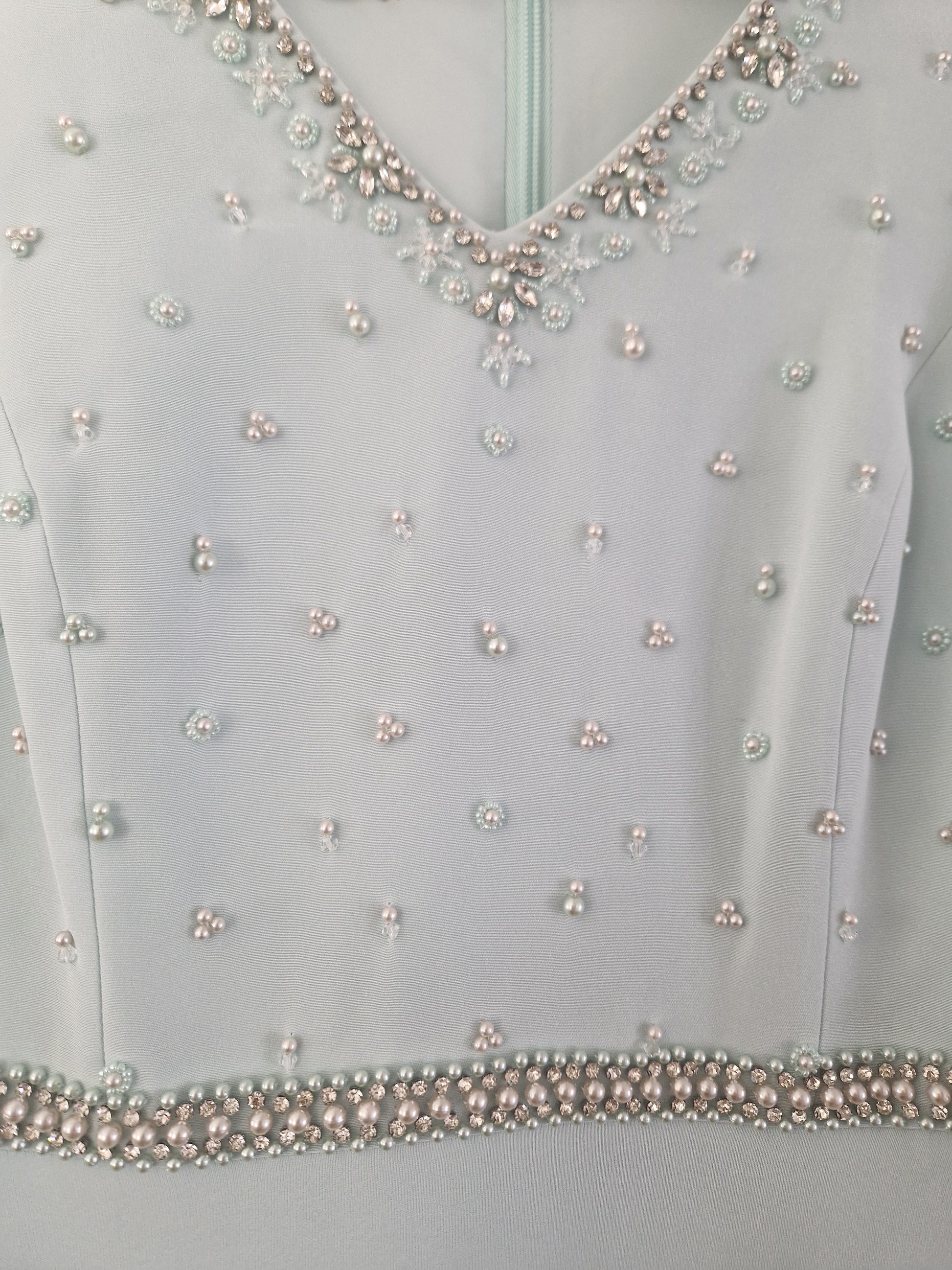 close up picture of embellishments on the dress