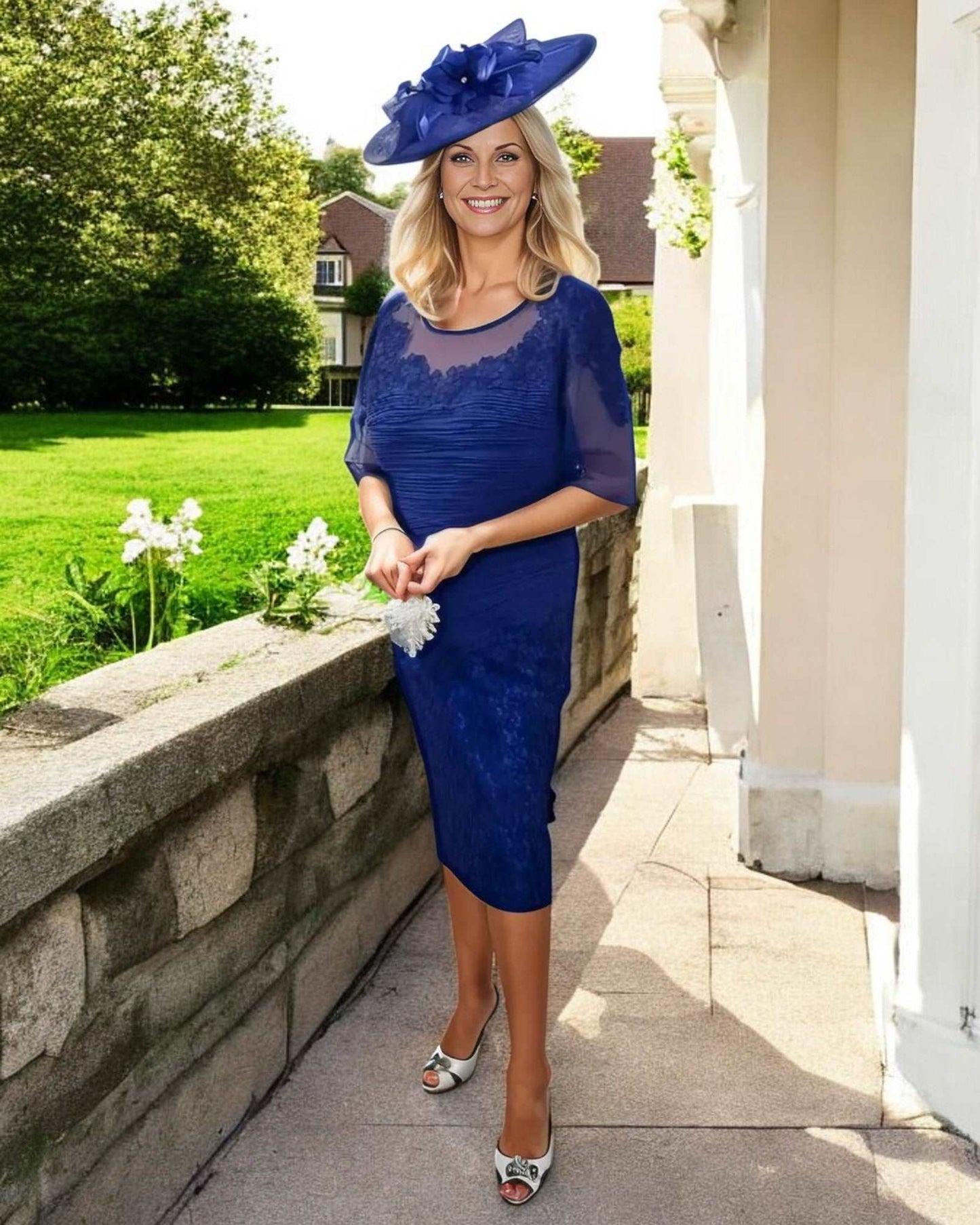 Rich Hydrangea.Embellished lace detailing to round necklineElbow length sleevesRuched throughout the bodice and skirt with contrasting lace appliqueSits just below the knee - Signature Dress.Suitable for Mother of the Bride, Mother of the Groom, Stepmother of the bride,  Stepmother of the Groom, or Wedding guests.