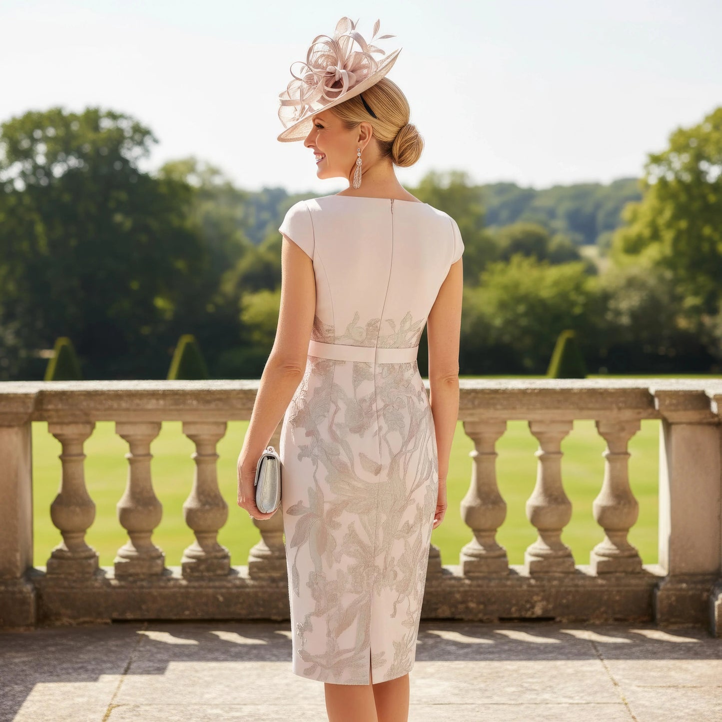 A stunning two piece by Rosa Clara Couture club Pink mother of the Bride Outfit.

The dress is knee length with short length sleeves and round neckline.