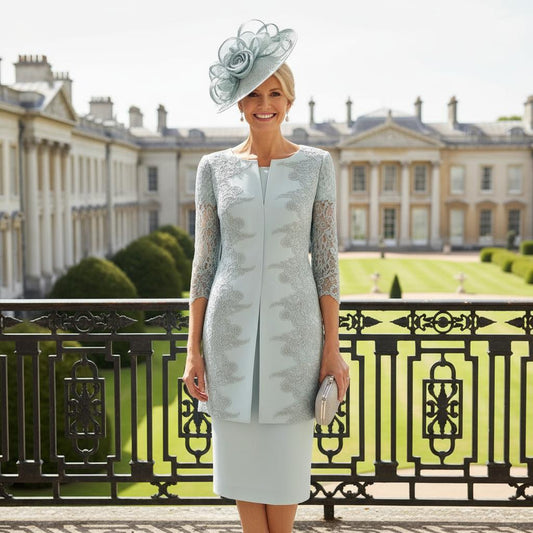 Woman Wearing a Rosa Clara Couture Club light blue Mother of the bride dress and jacket. Signature Dress.