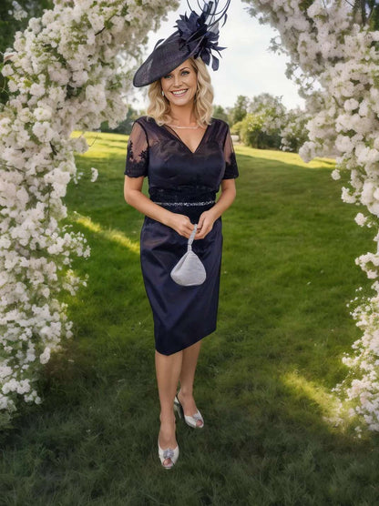 stunning two-piece outfit crafted in navy satin, featuring 3/4 lace sleeves and embellished detailing, true elegance to any Mother of the Bride ensemble. 