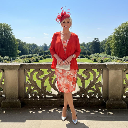 Woman in a red 2 piece outfit with a floral pattern - Signature Dress