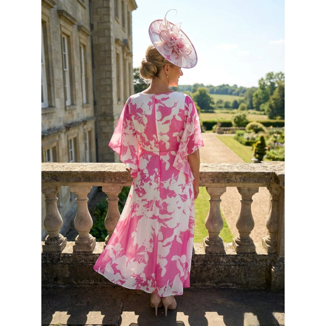 Back view of the Lizabella 2664 hot pink chiffon dress with soft, floaty sleeves and elegant shaping.