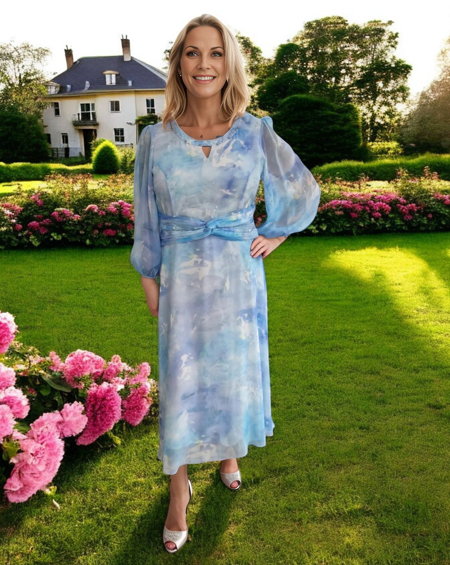 This exquisite dress is the perfect choice for a glamorous summer occasion, ideal for the beloved Mother of the Bride. Mother of the Bride Dress in Barnsley - Signature Dress.