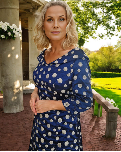 This Blue poker dots dress has a gorgeous A shape and high low design, complete with a Flattering V neckline. It also features elegant crystals and pearls trimming, as well as half sleeves and a convenient back zip. Plus, it's fully lined for a beautiful sheen.