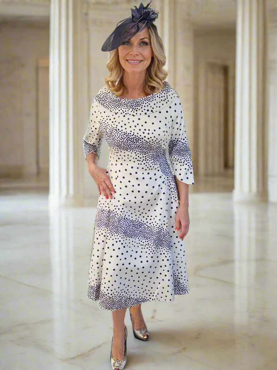 Lizabella Dress Lovely polkadot print Aline dress with elbow length sleeves. The Aline skirt skims gently over the hips creating a super flattering shape.