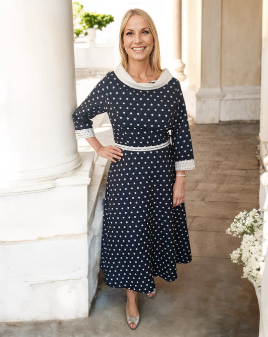 Lizabella - Spot Sparkle Dress

This stunning dress is ideal for mother of bride/groom or any special occasion, featuring a striking polka dot design with a gorgeous collar and cuff detail and side slip pockets

Style - 2526-30

Colour - Navy/White

Fabrics - 83% Polyester, 12% Metalic Thread, 5% Elastane

Lining - 100% Acetate