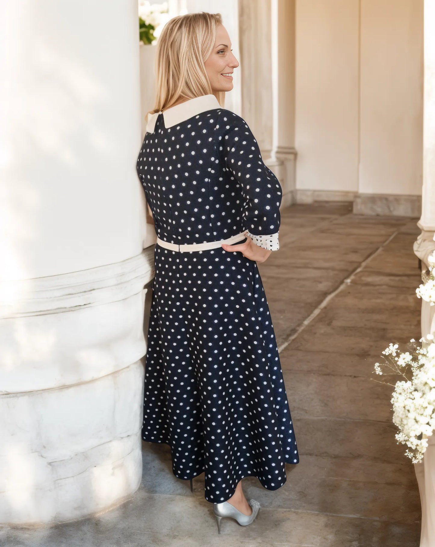 Lizabella 2526- Navy Spot Sparkle Dress

Be the centre of attention at any special occasion with this stunning Lizabella 2526 Navy Spots dress! Its striking polka dot design and elegant collar and cuff detail will make you stand out, while the side slip pockets add convenience and charm. Ideal for the Mother of the bride or groom, this dress is perfect for any event that requires a touch of grace and elegance. Signature Dress