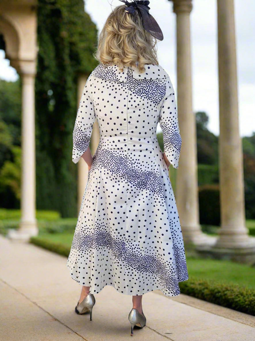 Lizabella Dress Lovely polkadot print Aline dress with elbow length sleeves. The Aline skirt skims gently over the hips creating a super flattering shape.