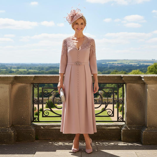 Woman in a dusty pink dress with lace sleeves by veni infantino - Signature Dress