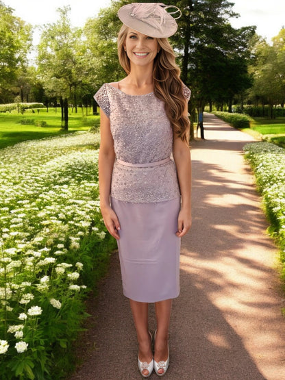 Veni Infantino Dress 991124 Mauve

Veni Infantino Dress is a stunning choice for the mother of the bride. It features a zip closure at the back and is lined for comfort. The dress also has a slight stretch, ensuring a perfect fit. The exquisite embellished pearls add a touch of elegance to the overall look. With a detachable belt, cap sleeves, and a peplum waist, this dress is both stylish and flattering. The soft heather colour, with its brown and mauve purple tones, adds a sophisticated touch to any occas