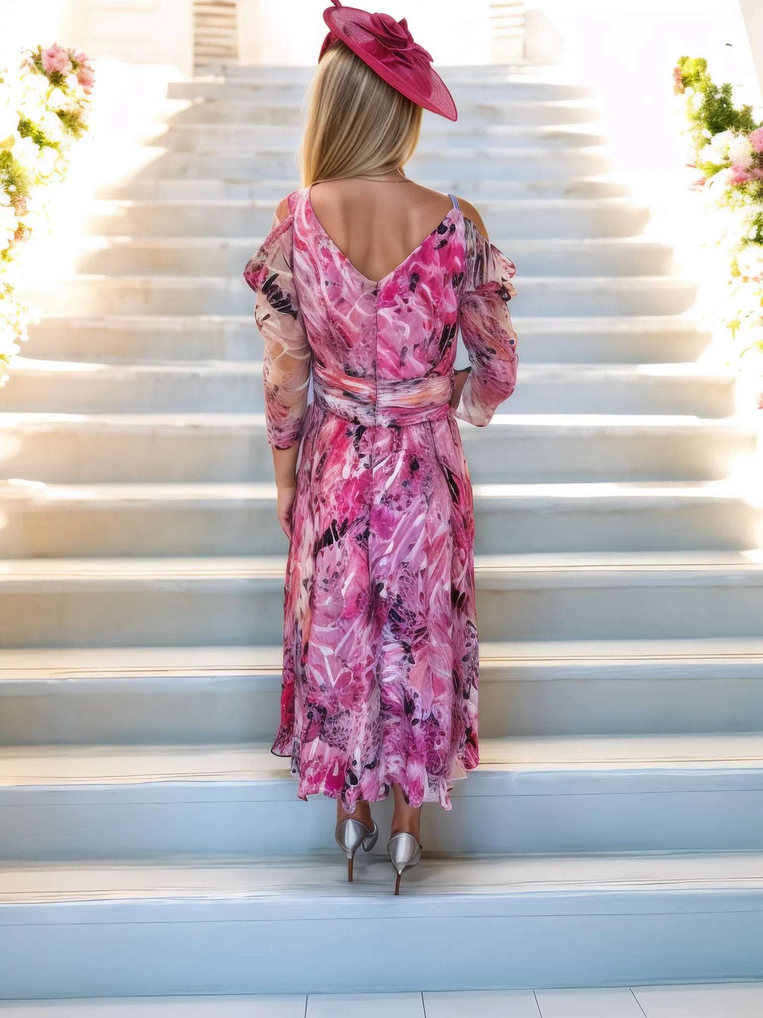 Veni Infantino Pink dress is a versatile dress made from lightweight chiffon. Its cold shoulder and 3/4 sleeves add a trendy touch to the animal print pattern. 