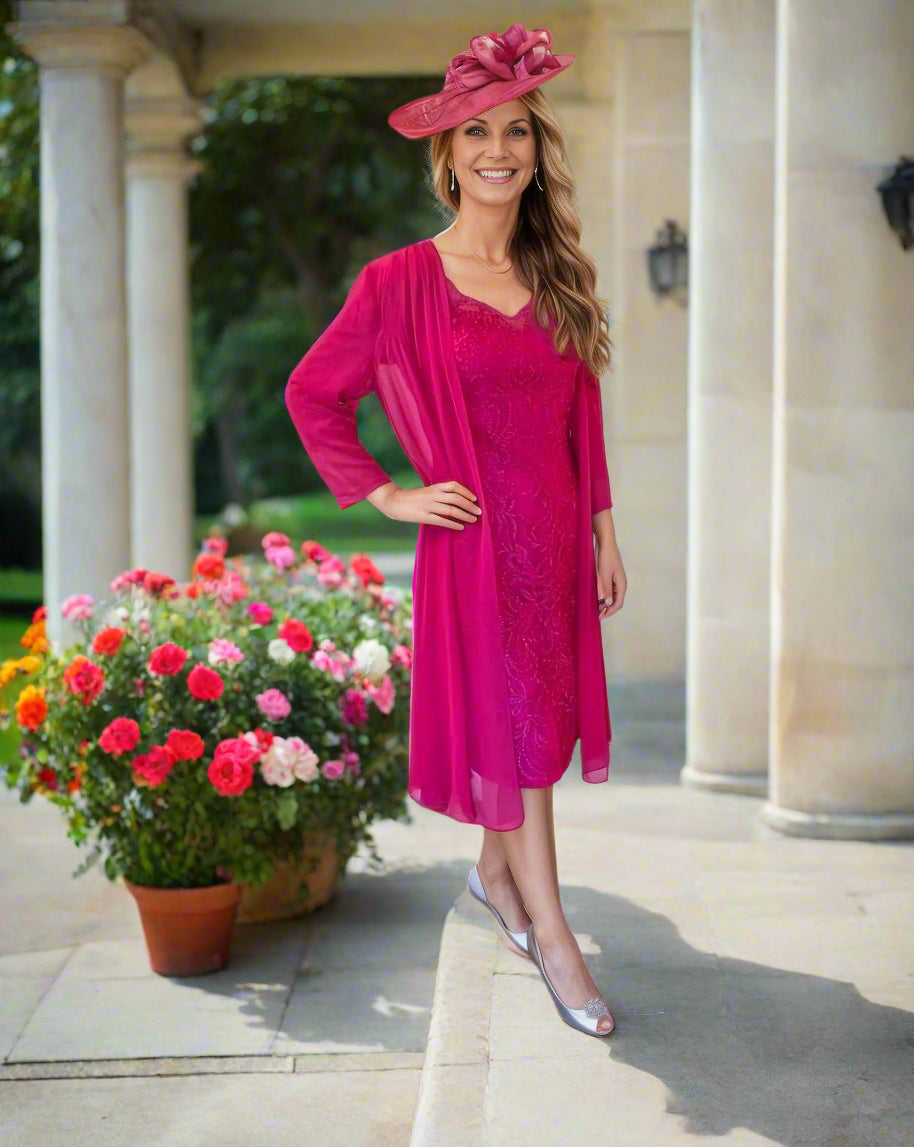 It is both lined and slightly stretchy, with a padded bust. The all-over embellishments, including a chiffon jacket, add extra charm to this elegant piece.