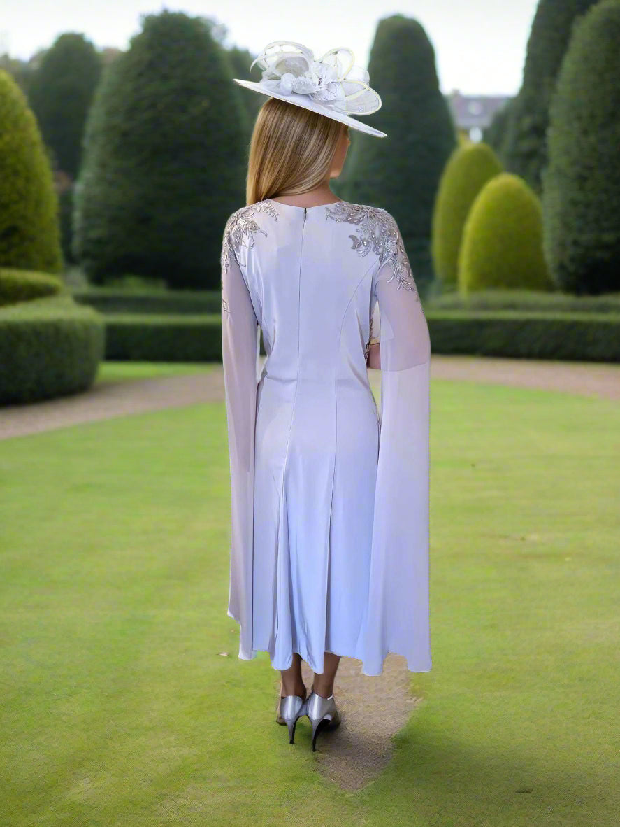 Veni Infantino dress in silver with long cape sleeves a perfect dress for the mother of the bride or mother of the groom or event to wear at ascot races!. 