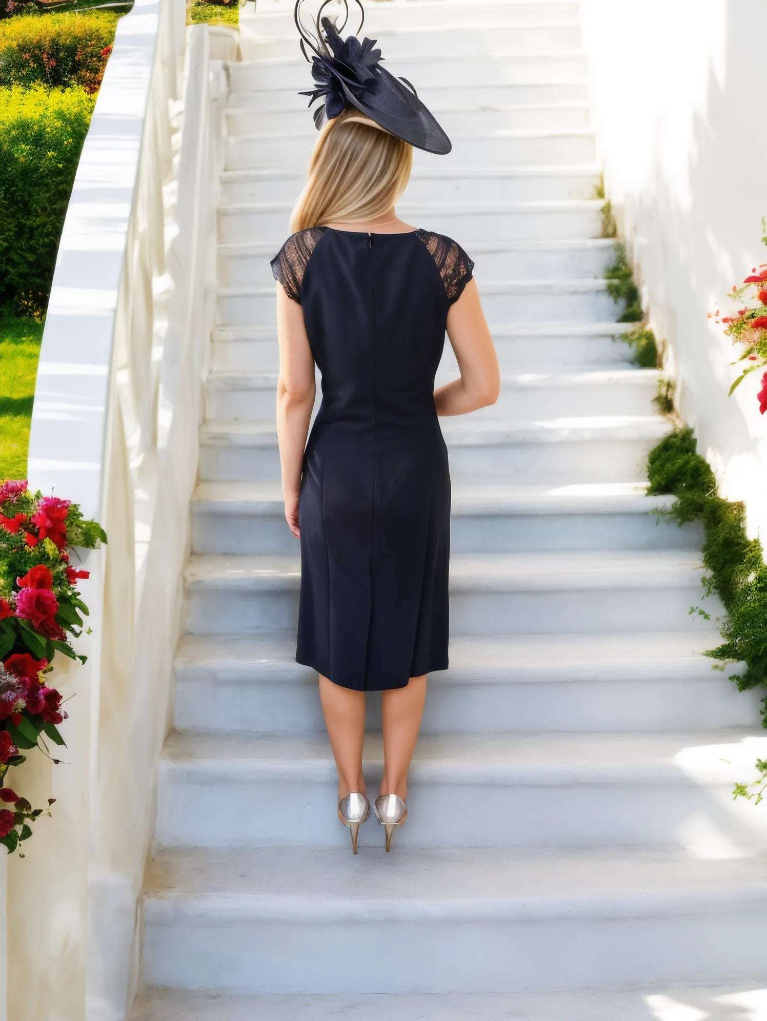 This elegant shift dress by Veni Infantino is the perfect choice for a mother of the bride outfit. It features a concealed zip at the back for a seamless look. The dress is fully lined and adorned with beautiful lace detail, adding a touch of sophistication. To complete the ensemble, the outfit includes a matching jacket.