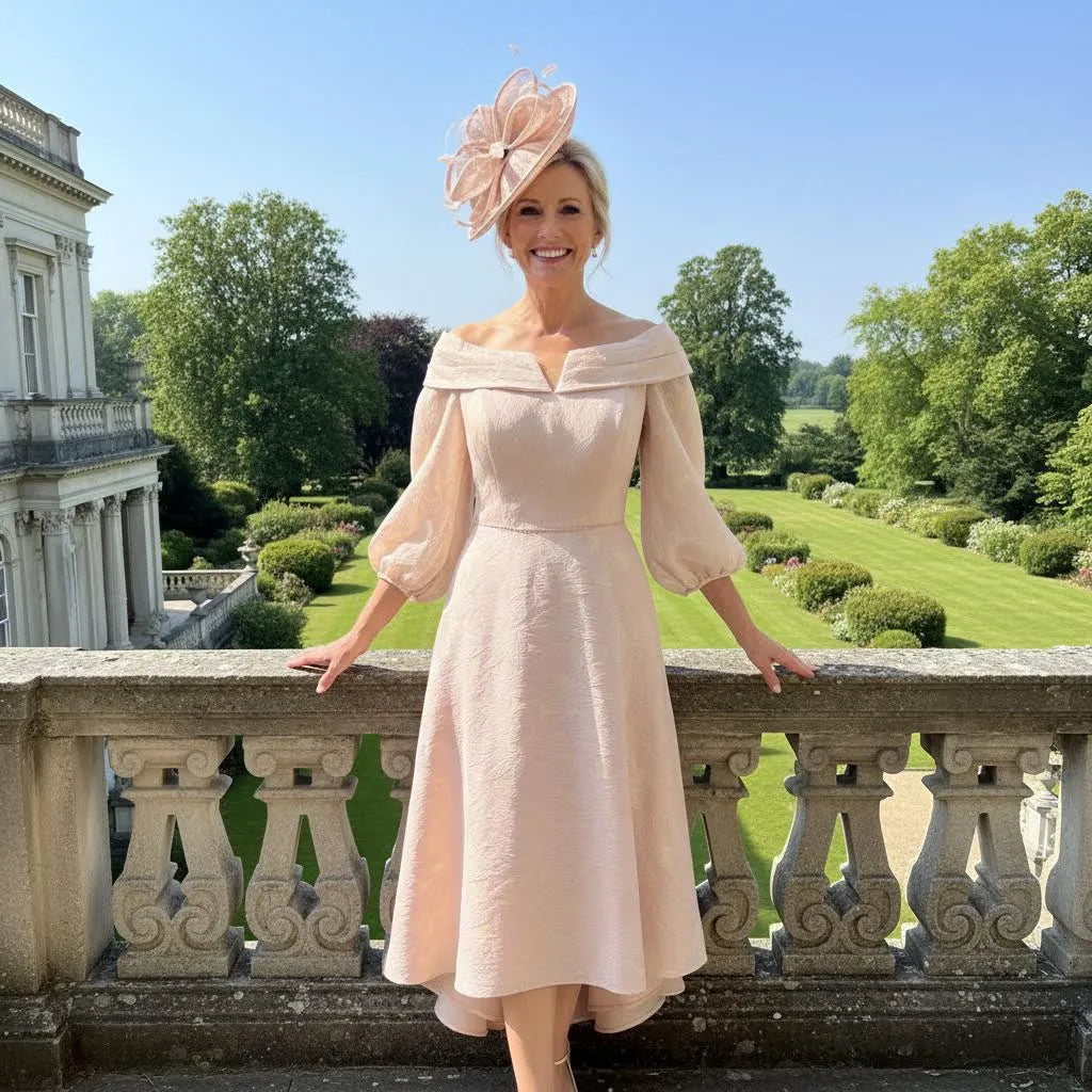 Pink and gold Veromia VO0248 high‑low dress with boned bodice and ¾ sleeves, shown from the front.