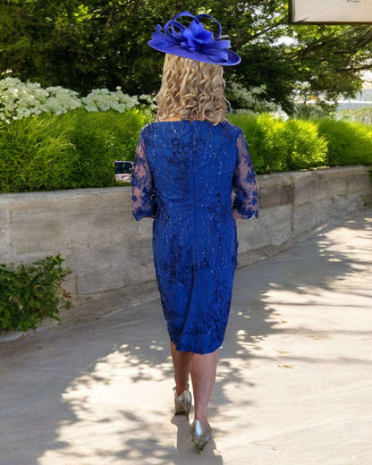 Veromia fitted dress comes with a intricately detailed floral lace overlay decorated with embellishments. Pair it up with high heels and a matching fascinator