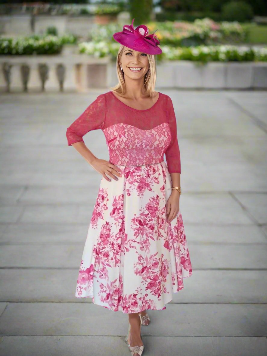 Indulge in timeless elegance with this light pink floral dress featuring 3/4 lace sleeves, a netted full skirt, and a midi length. Adorned with a delicate beaded waistband, this dress exudes sophistication and refinement.