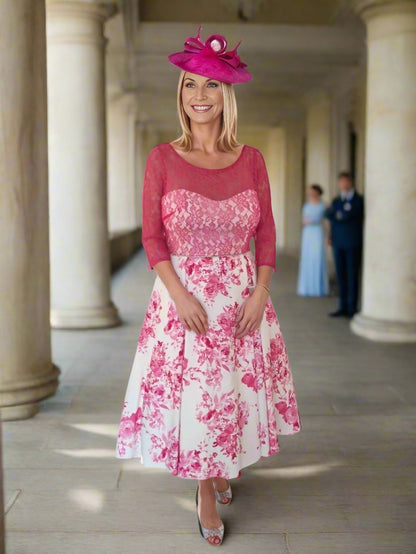 Indulge in timeless elegance with this light pink floral dress featuring 3/4 lace sleeves, a netted full skirt, and a midi length. Adorned with a delicate beaded waistband, this dress exudes sophistication and refinement.