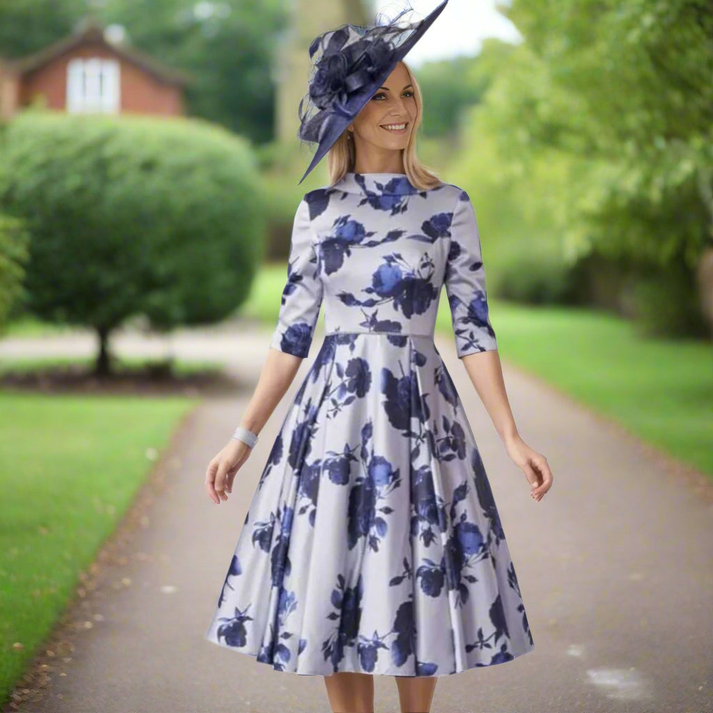 Fit and Flare Floral Dress from Veromia Occasions. full skirt, a bateau neck, V at the back, 3/4 sleeves, a midi length and diamante trim to the waist.