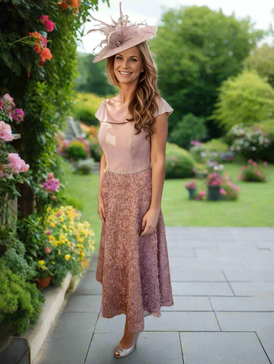 Bardot off-the shoulder a-line dress from Veromia Occasions. The dress features a stunning skirt adorned in pink petals, and scattered sequins the texture is amazing! A perfect outfit for mother of the bride and groom or any other special occasion.