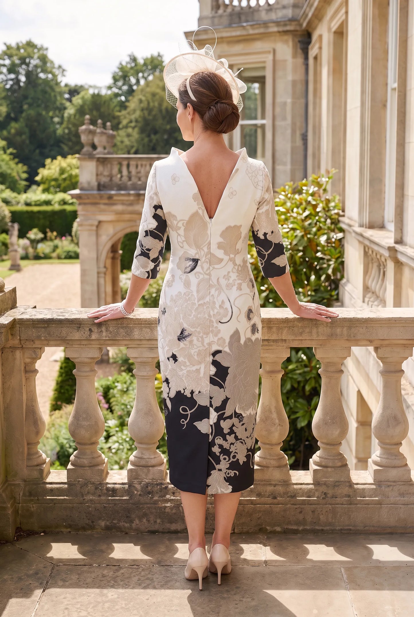 Rear view of the Champagne Mother of the Bride Dress by Fely Campo 21332 showing the elegant V-back neckline and flattering fitted silhouette.