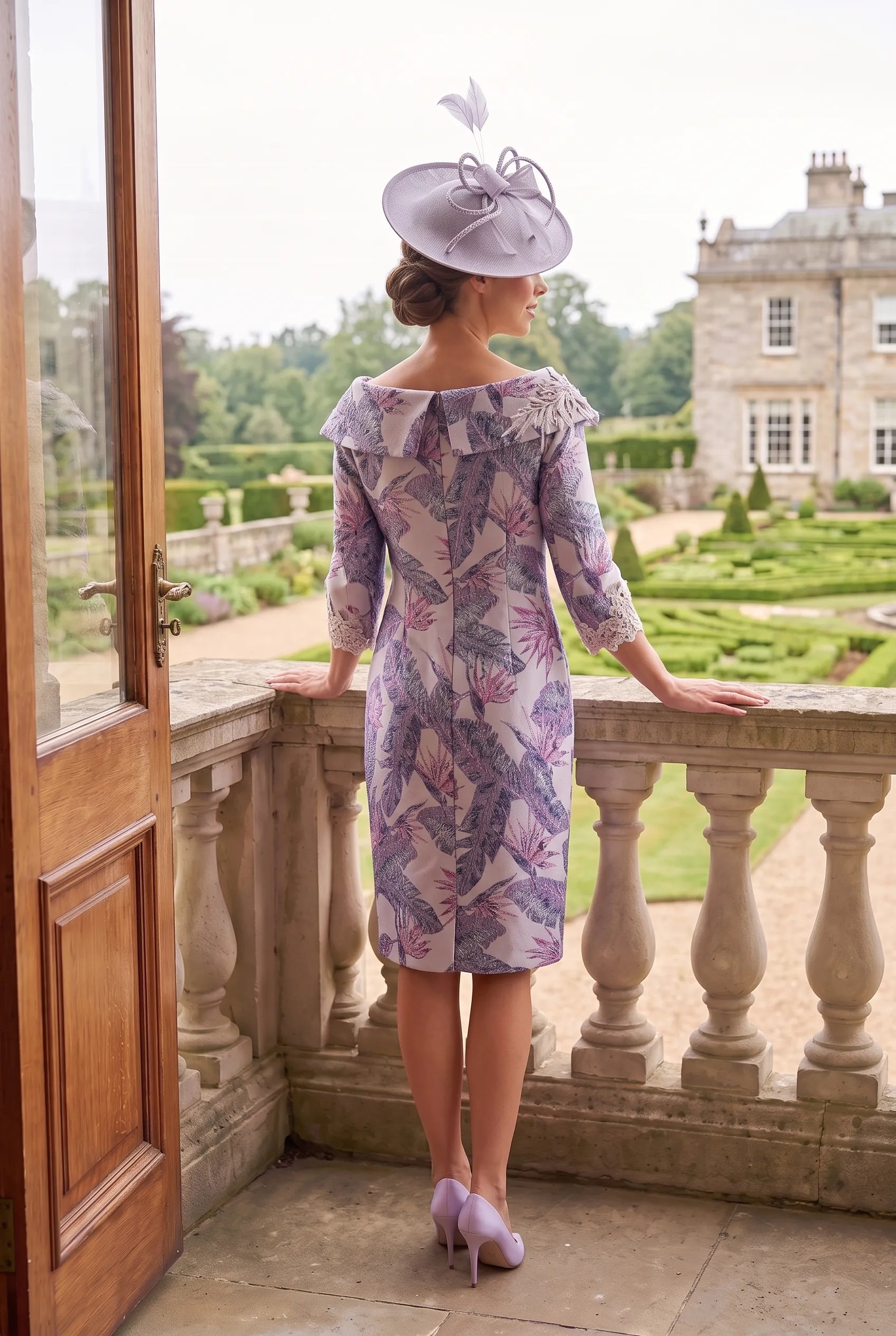 Lilac Mother of the Bride Dress Lizabella 2628 back view with a flattering fitted silhouette.