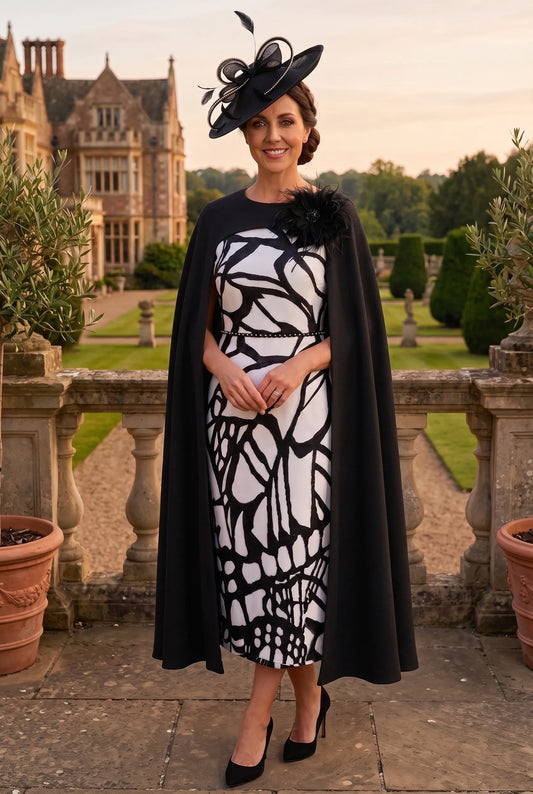 Lizabella 2266 black and ivory mother of the bride dress with structured cape overlay.