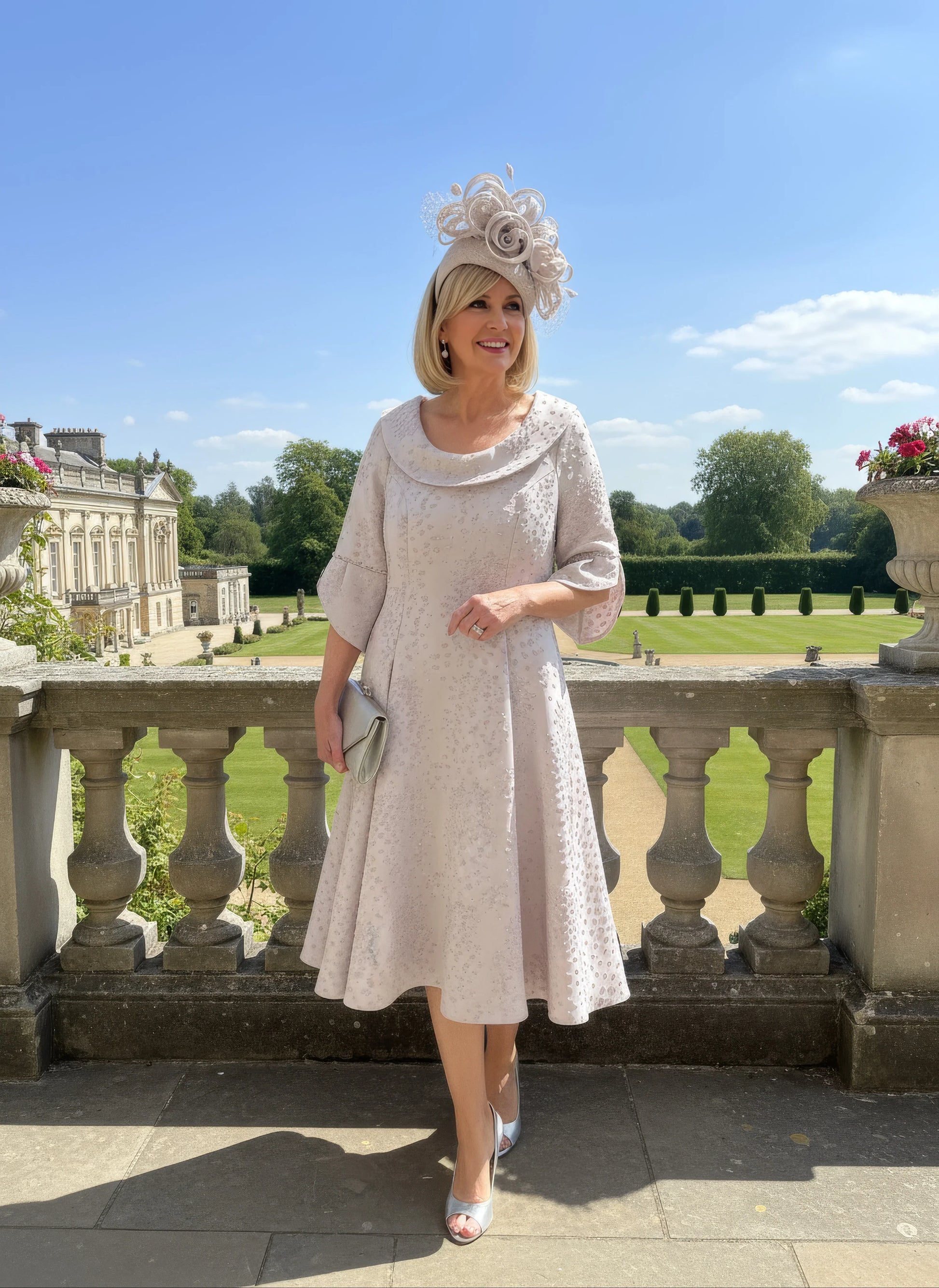 Lizabella 2378 blush pink Mother of the Bride dress with fit and flare skirt, beaded sleeves and side pockets.