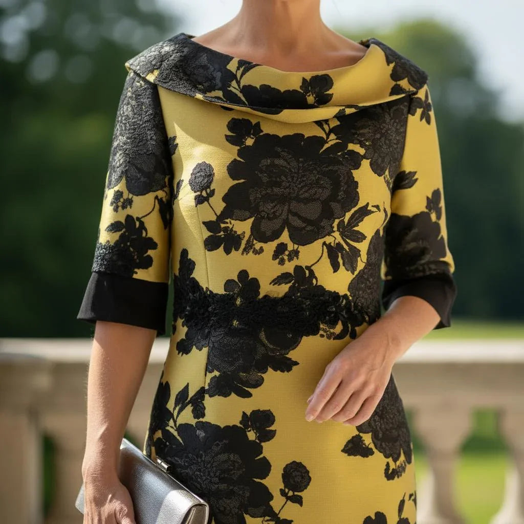 close view of a Lizabella 2950 mustard Mother of the Bride dress with tailored fit and elegant embellished detailing.