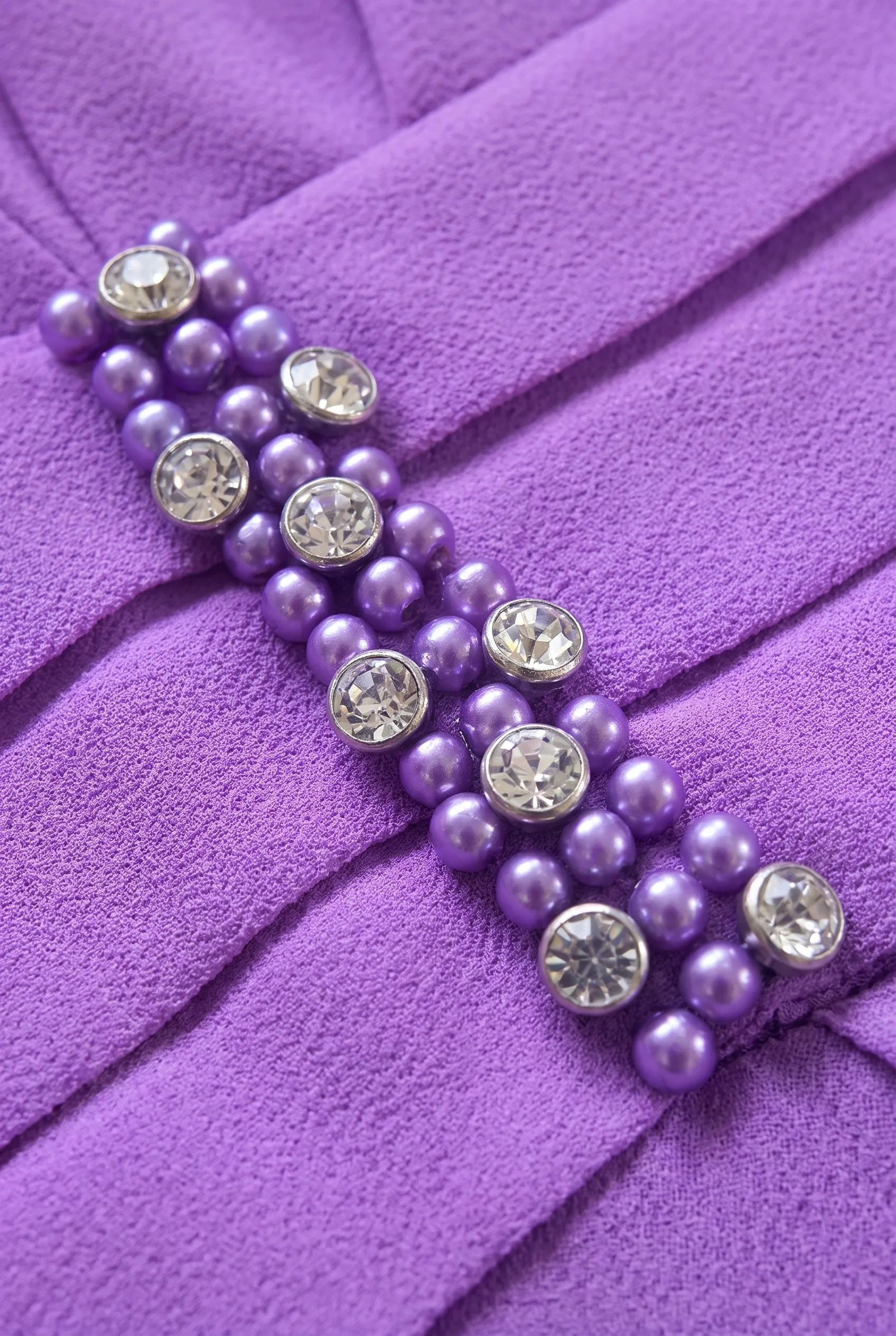 Close-up of crystal embellished waistband on Lilac Lizabella 5081 Mother of the Bride jumpsuit
