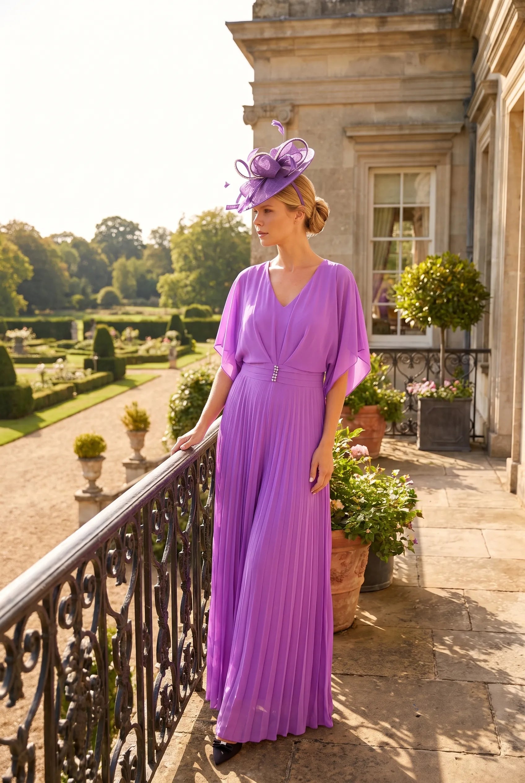Side view of Lilac Mother of the Bride jumpsuit by Lizabella 5081 with flowing pleated trousers