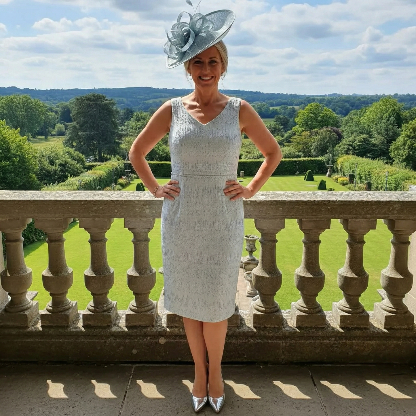 Blue Lizabella 7211 Mother of the Bride dress with embellished beads and pearls.