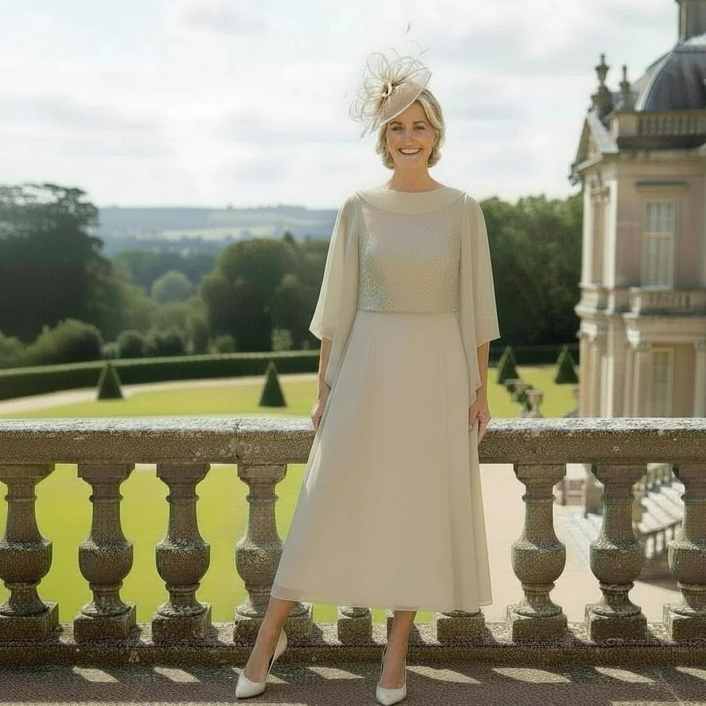 Lizabella 7270 stone Mother of the Bride dress and jacket with chiffon sleeves, floaty skirt and diamanté waist detail.