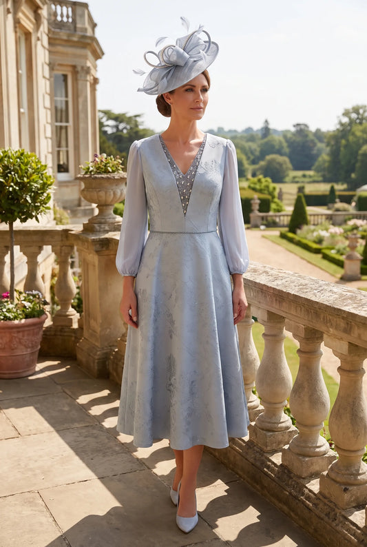 Powder blue Mother of the Bride dress by Lizabella 2808 with crystal V-neckline and pleated chiffon sleeves