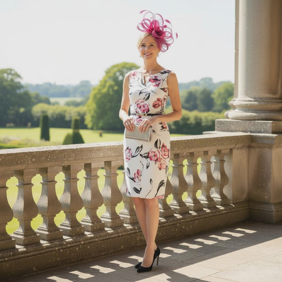 Woman in a floral joseph ribkoff dress. Signature Dress