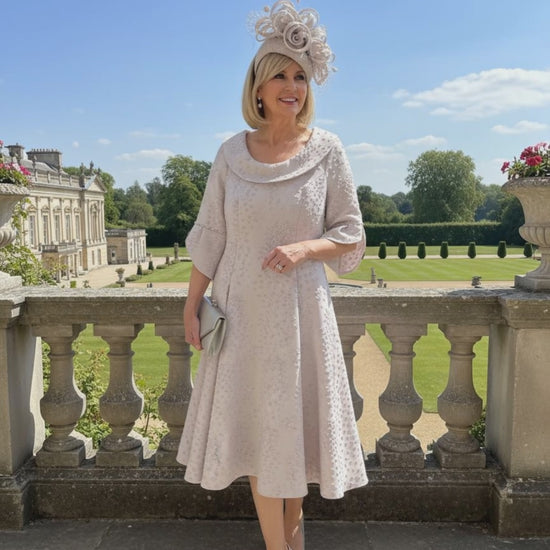 Lizabella a line pink 2378 mother of the bride dress with 3/4 sleeves and slip pockets. Signature Dress