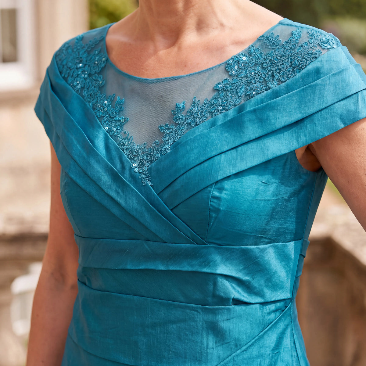 Rich Jade Green Ispirato occasion dress with intricate embroidery and embellished sweetheart neckline