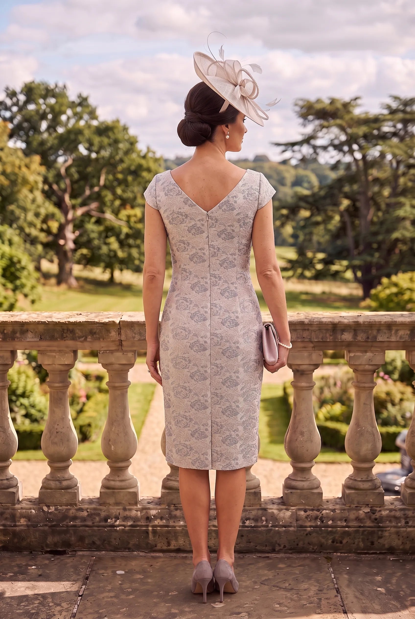 Back view of the Silver Mother of the Bride Dress Lizabella 7242 with a V-back neckline.
