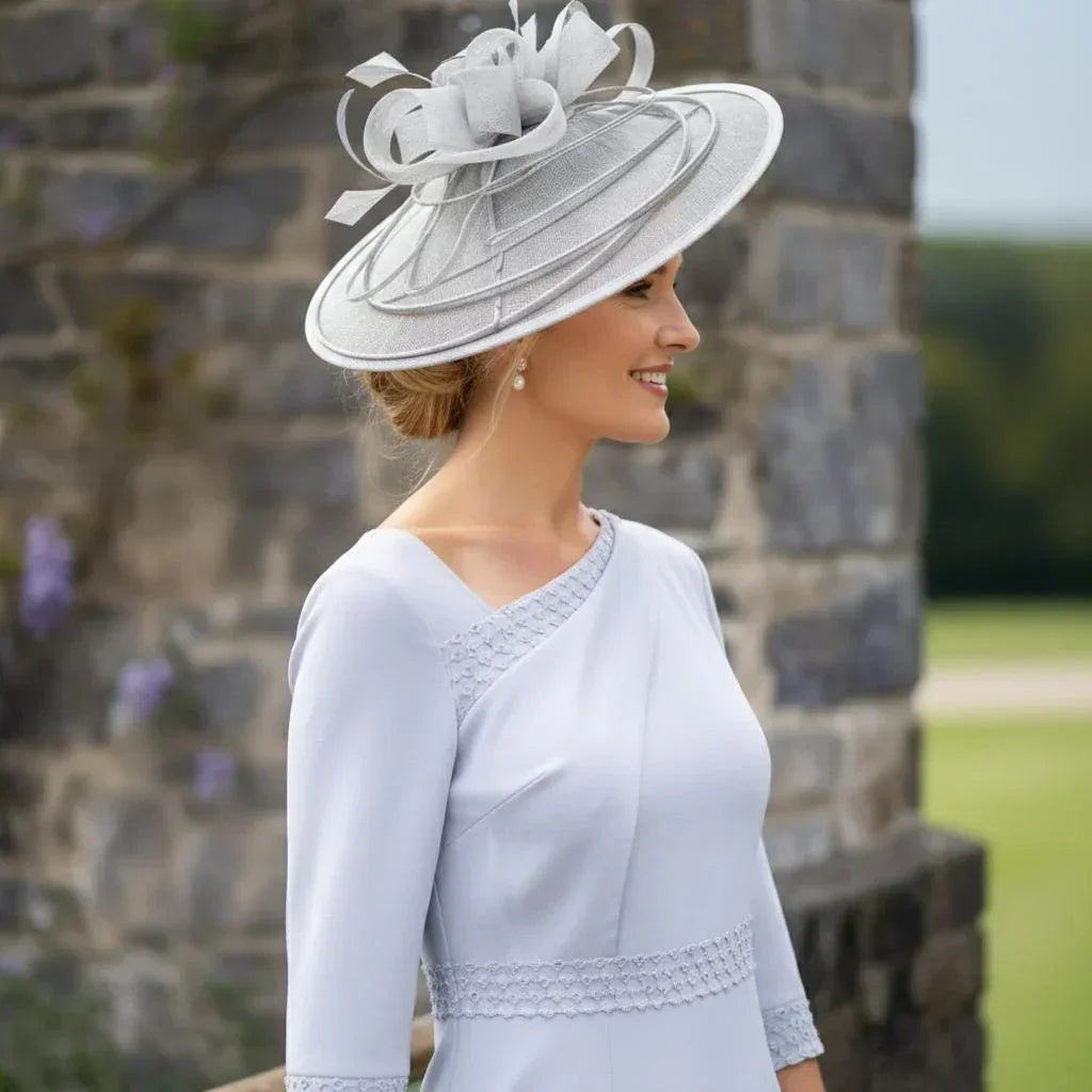 Close-up of Silver Mother of the Bride Dress Lizabella 2472 showing asymmetric neckline and pearl embellished waist