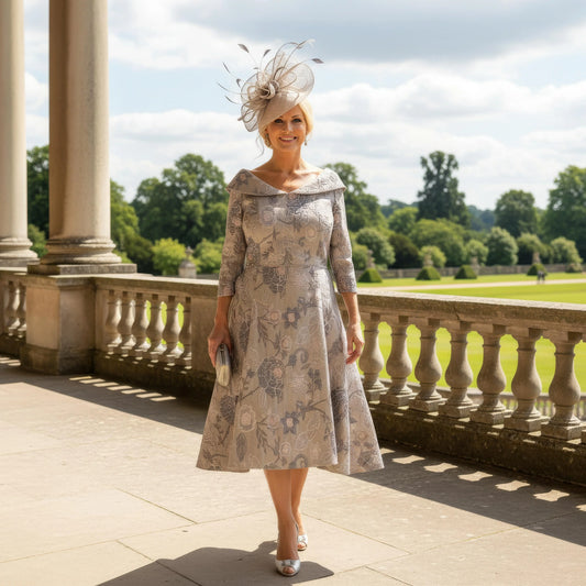 Taupe Mother of the Bride Dress Lizabella 2480 with metallic floral design, V-neckline and pearl embellishment