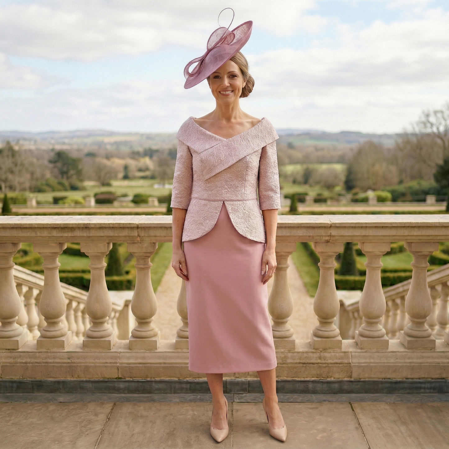 Rose pink Veromia VO7705 Mother of the Bride dress with Bardot neckline and peplum waist.