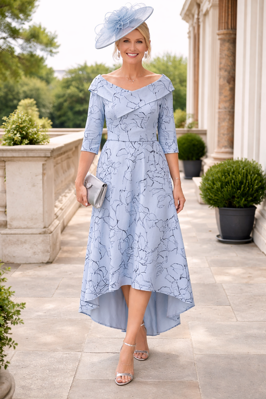 Front view of the Veromia VO9681 baby blue and navy print mother of the bride dress with V neckline, 3/4 sleeves and sparkly waist detail.